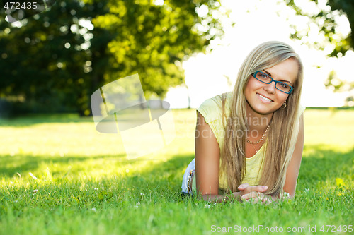 Image of young woman in the park