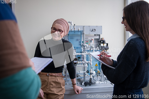 Image of young students doing practice in the electronic classroom