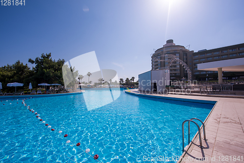 Image of tropical swimming pool in hotel resort