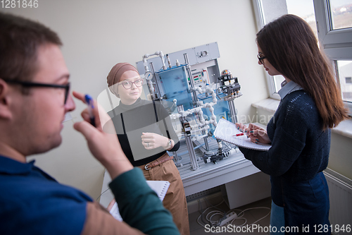 Image of young students doing practice in the electronic classroom