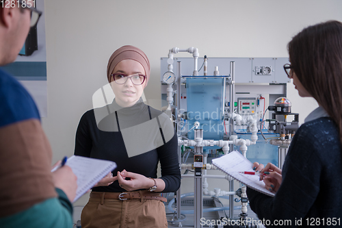 Image of young students doing practice in the electronic classroom