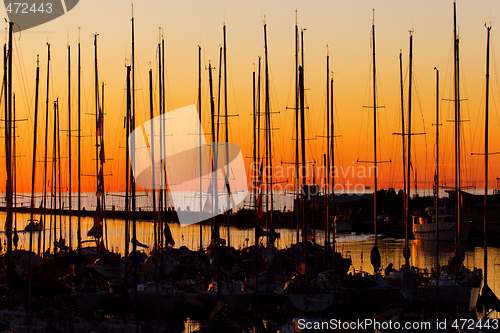 Image of yachts at sunset