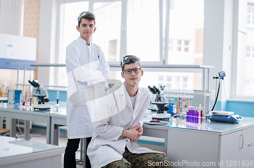 Image of Group of young medical students doing research