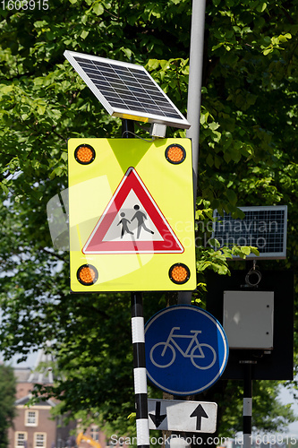 Image of Pedestrians Crossing Solar