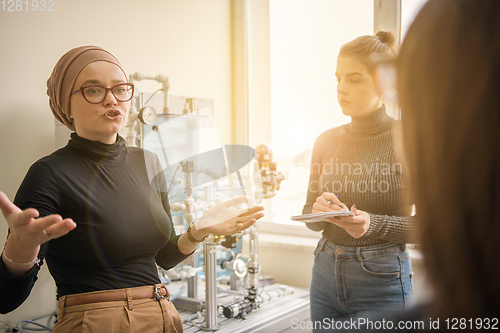 Image of young students doing practice in the electronic classroom