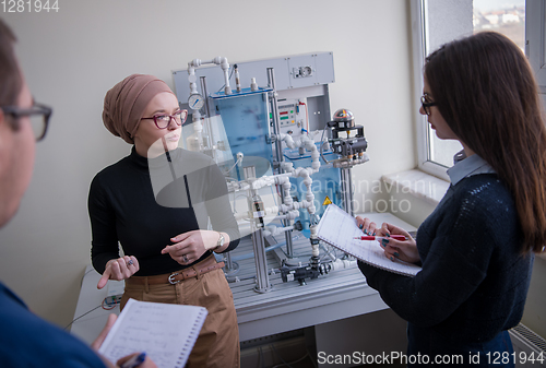 Image of young students doing practice in the electronic classroom