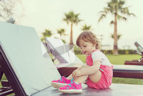 Image of little cute girl enjoying summer vacations