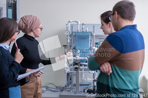 Image of young students doing practice in the electronic classroom