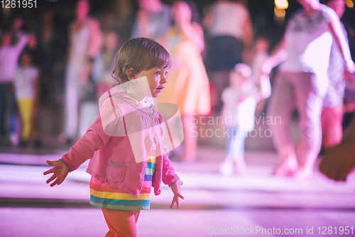 Image of little girl dancing in the kids disco