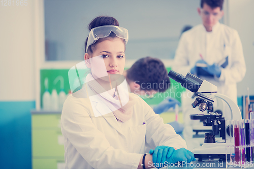 Image of Group of young medical students doing research