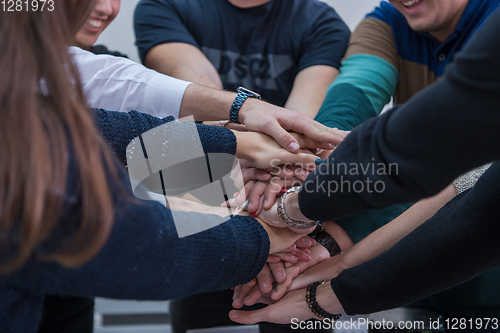 Image of students celebrating successfully finished project