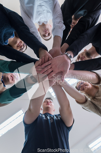 Image of students celebrating successfully finished project