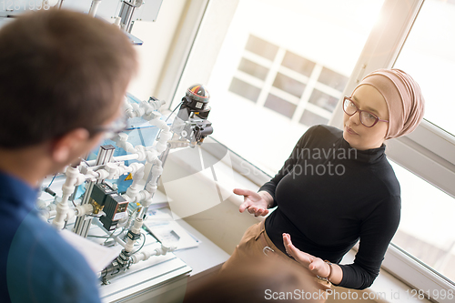 Image of young students doing practice in the electronic classroom