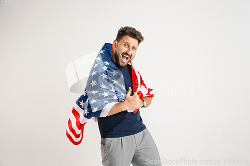 Image of Young man with the flag of United States of America