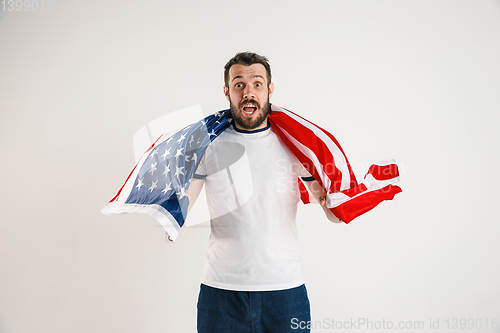 Image of Young man with the flag of United States of America