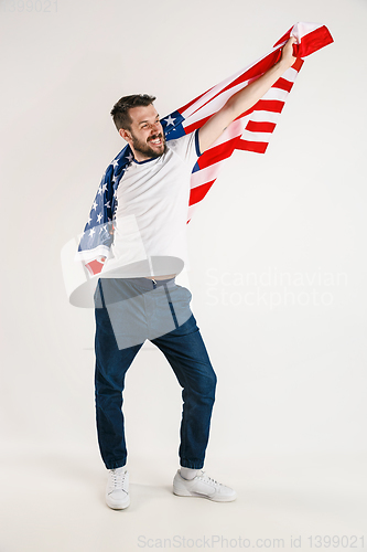 Image of Young man with the flag of United States of America