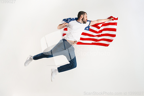 Image of Young man with the flag of United States of America