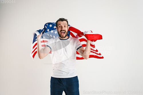 Image of Young man with the flag of United States of America