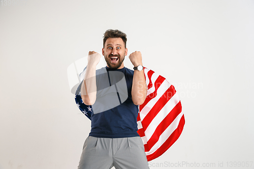 Image of Young man with the flag of United States of America