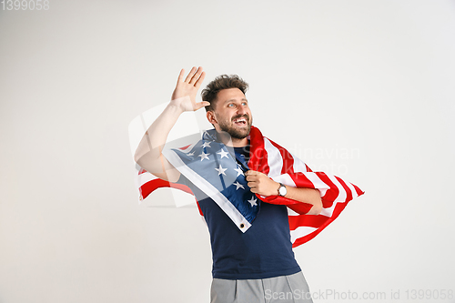 Image of Young man with the flag of United States of America