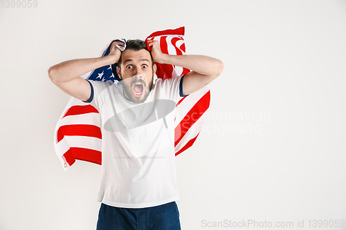 Image of Young man with the flag of United States of America