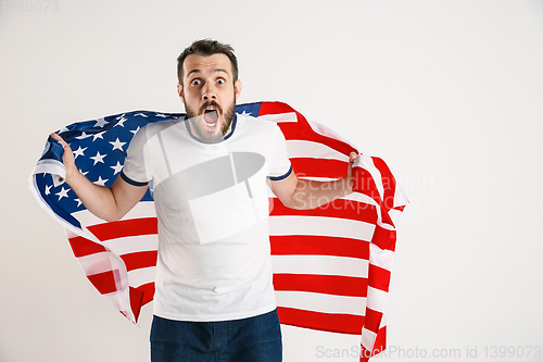 Image of Young man with the flag of United States of America