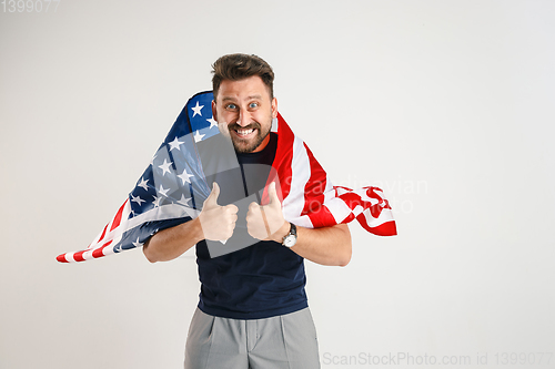 Image of Young man with the flag of United States of America