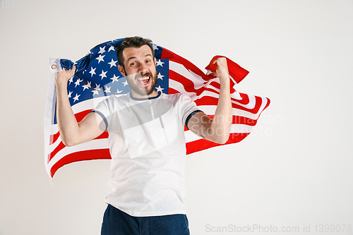 Image of Young man with the flag of United States of America