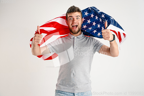 Image of Young man with the flag of United States of America