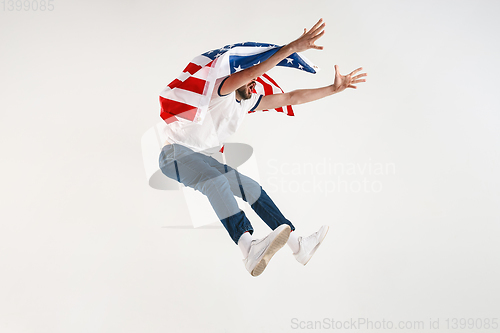 Image of Young man with the flag of United States of America