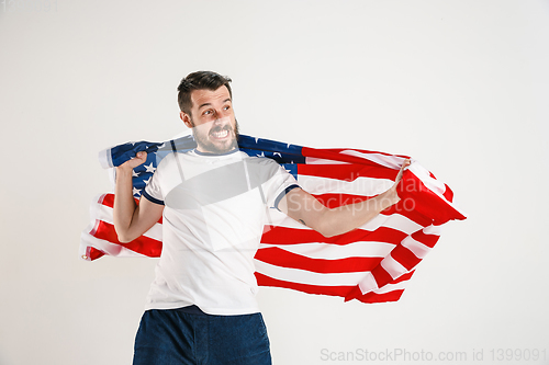 Image of Young man with the flag of United States of America