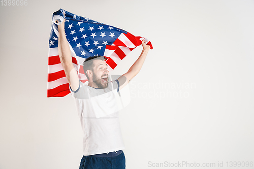 Image of Young man with the flag of United States of America