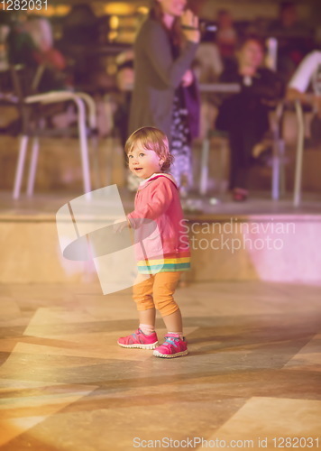 Image of little girl dancing in the kids disco