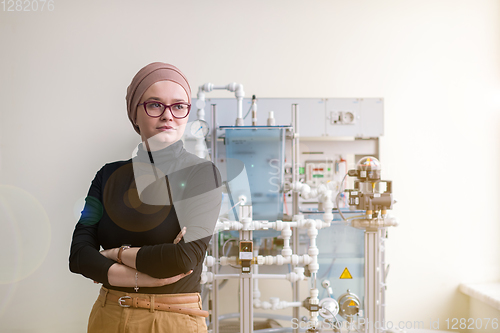 Image of portrait of muslim female student in the electronic classroom