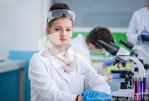 Image of Group of young medical students doing research