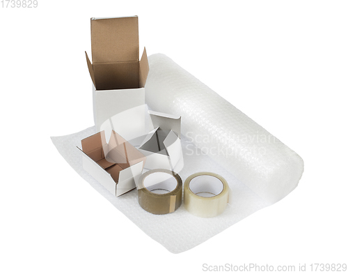 Image of Packing and shipping boxes and bubble wrap