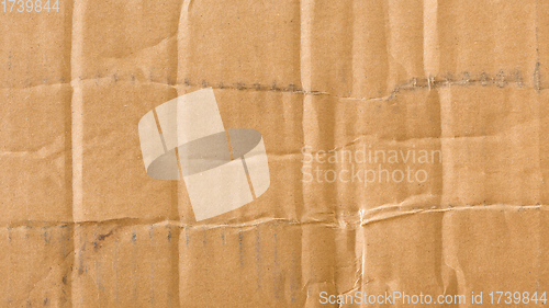 Image of Old wrinkled cardboard with visible marks