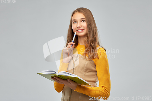 Image of teenage student girl with notebook or diary