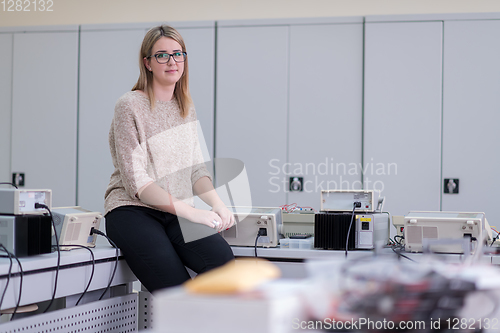 Image of female student sitting on the table