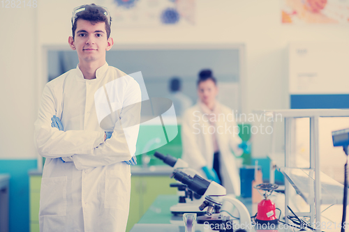 Image of portrait of medical student in white coat