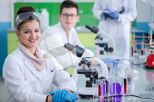 Image of Group of young medical students doing research