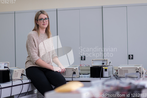 Image of female student sitting on the table