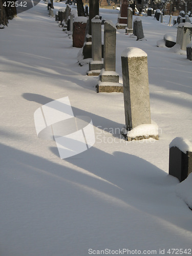 Image of snow on a cemetery