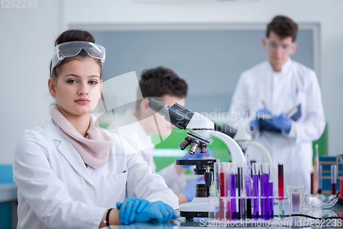 Image of Group of young medical students doing research