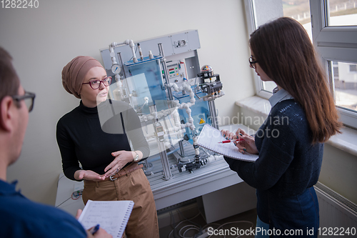 Image of young students doing practice in the electronic classroom