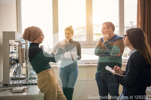 Image of young students doing practice in the electronic classroom