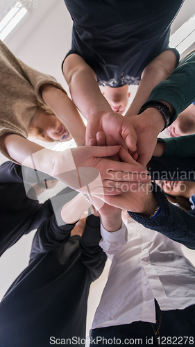 Image of students celebrating successfully finished project