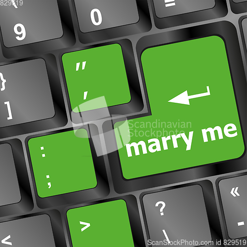 Image of Wording Marry Me on computer keyboard key