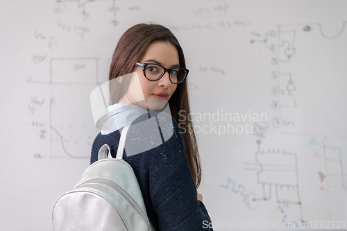 Image of portrait of a young beautiful female student