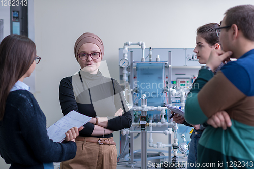 Image of young students doing practice in the electronic classroom